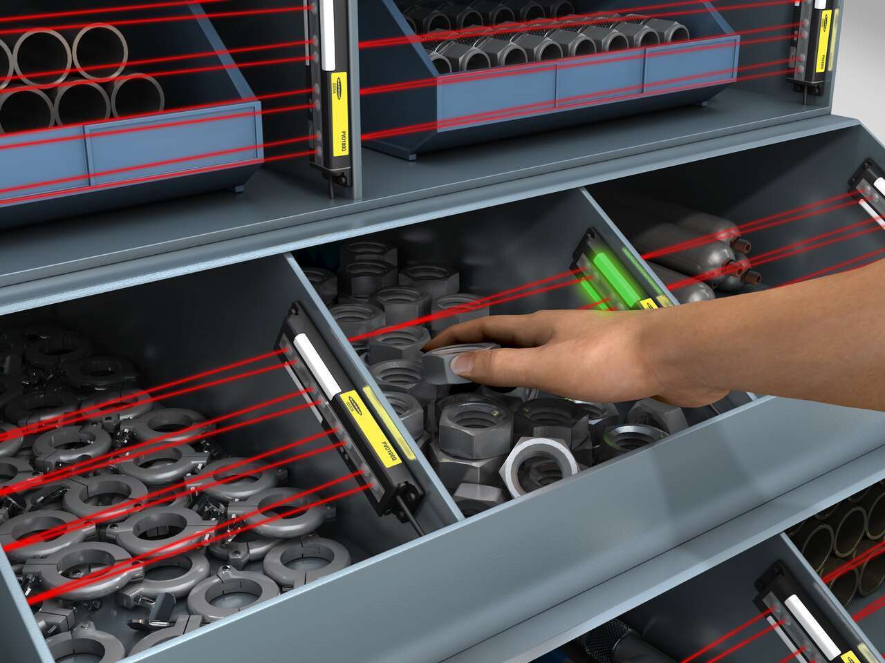 person picking bolts from a bin