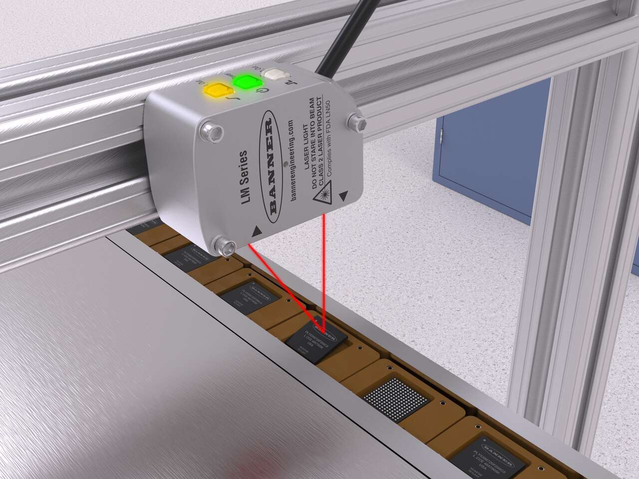 LM precision measurement sensor inspects IC chips seated in nests 