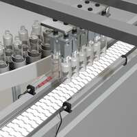 Monitoring Flow of Transparent Plastic Bottles on a Conveyor